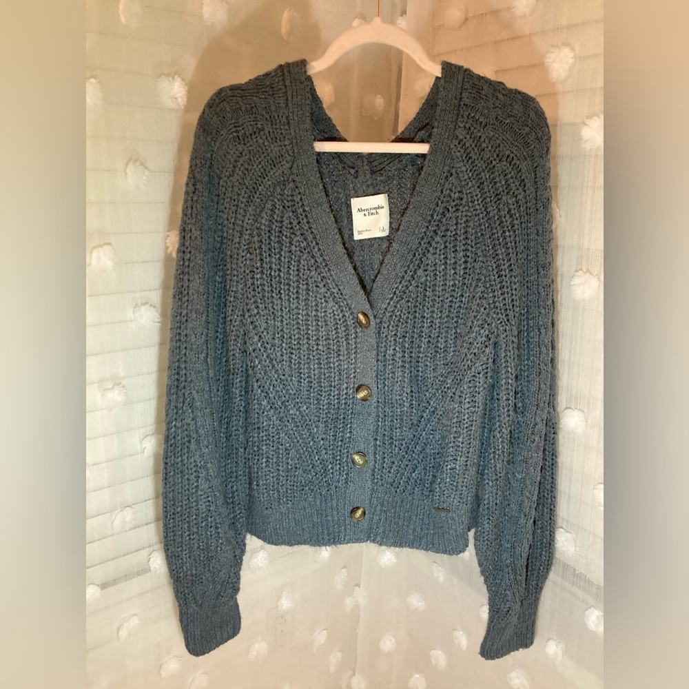 grey button up sweater